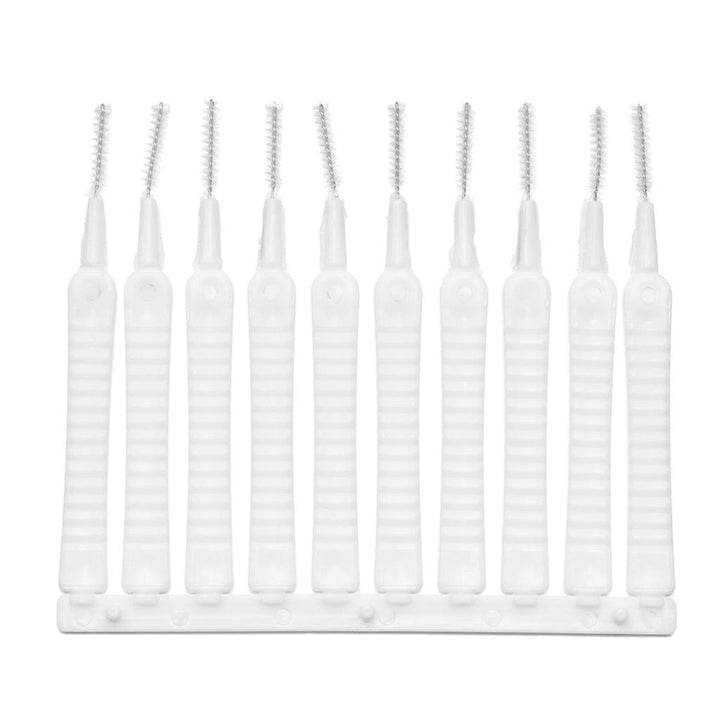 Anti-clogging shower head cleaning brushes