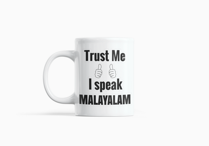 White Coffee Mug with "Trust Me, I Speak Malayalam" Print